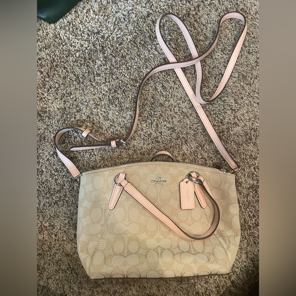 Coach crossbody with pink strap